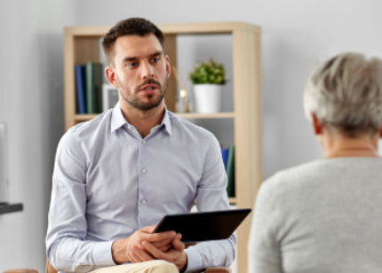 A survey talking to a client about their home to make it more efficient 